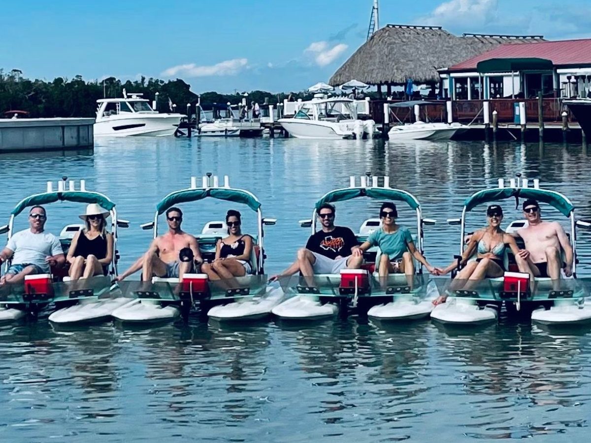a boat is docked next to a body of water