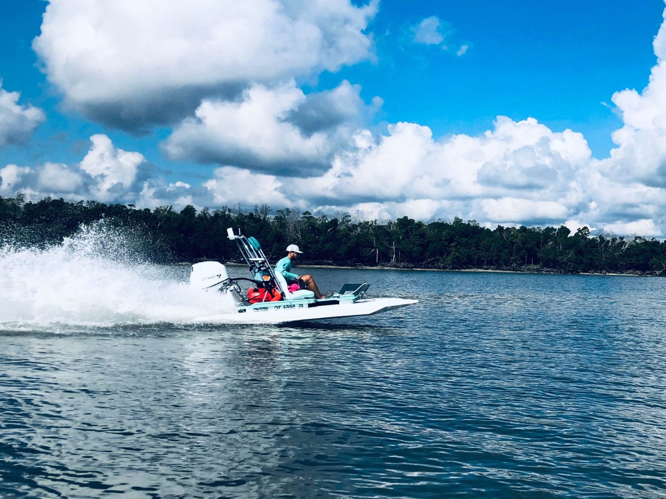 a small boat in a body of water